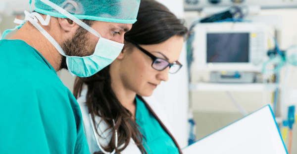 Doctors reviewing report