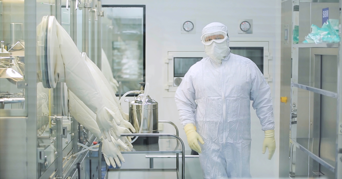 Sterile manufacturing operator gowned in cleanroom