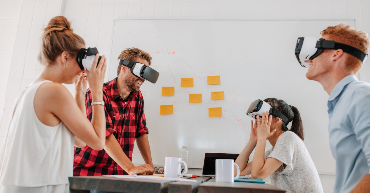 Team of people using Virtual Reality (VR) headsets for training